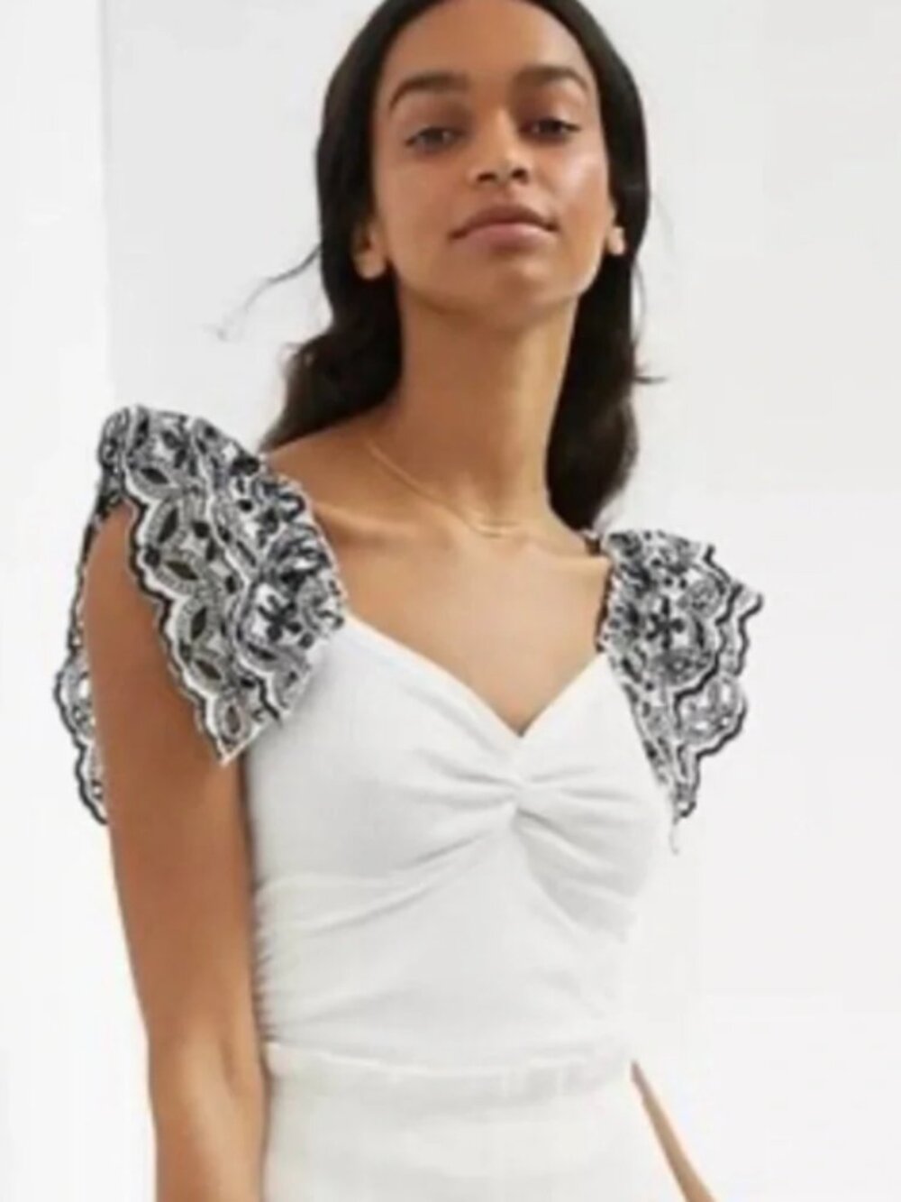 Anthropologie Top with Black & White Eyelet Sleeves EUC XS